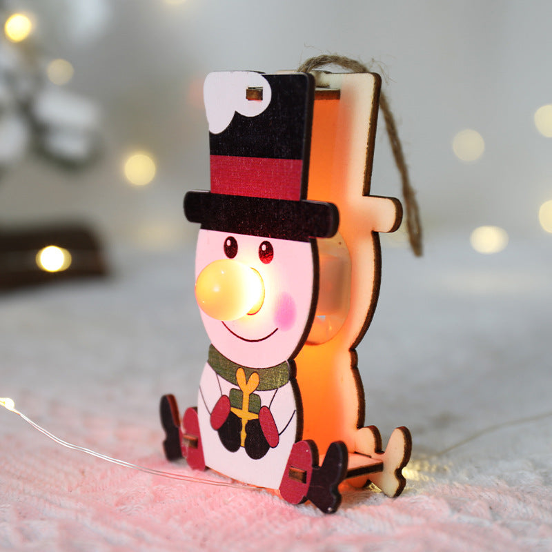 Painted red nose detail that identifies each wooden Christmas character