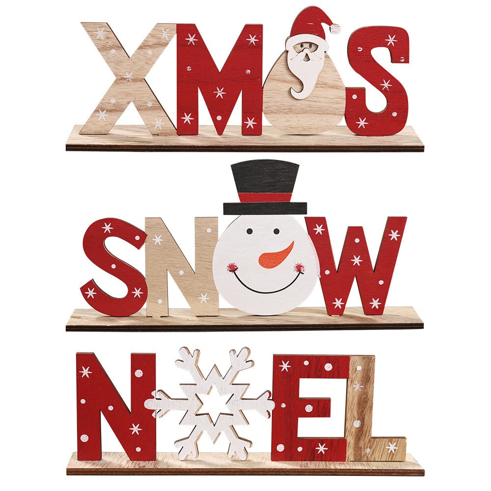 Wooden Christmas ornament cut into the word Snow