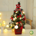 Mini PVC Christmas tree offered in gold or red, one per order