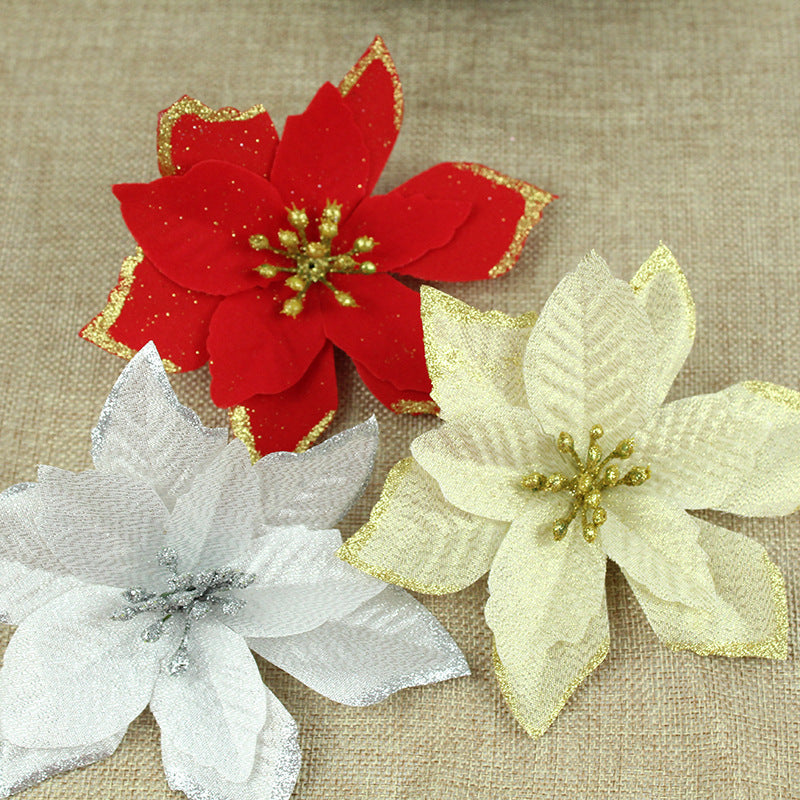 Silver fabric Christmas bloom finished with gold glitter along every petal