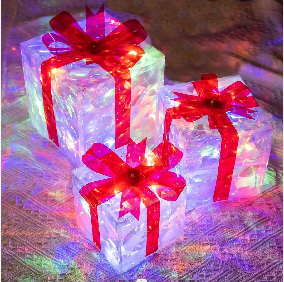 Red glowing Christmas gift box decoration that lights up on its own