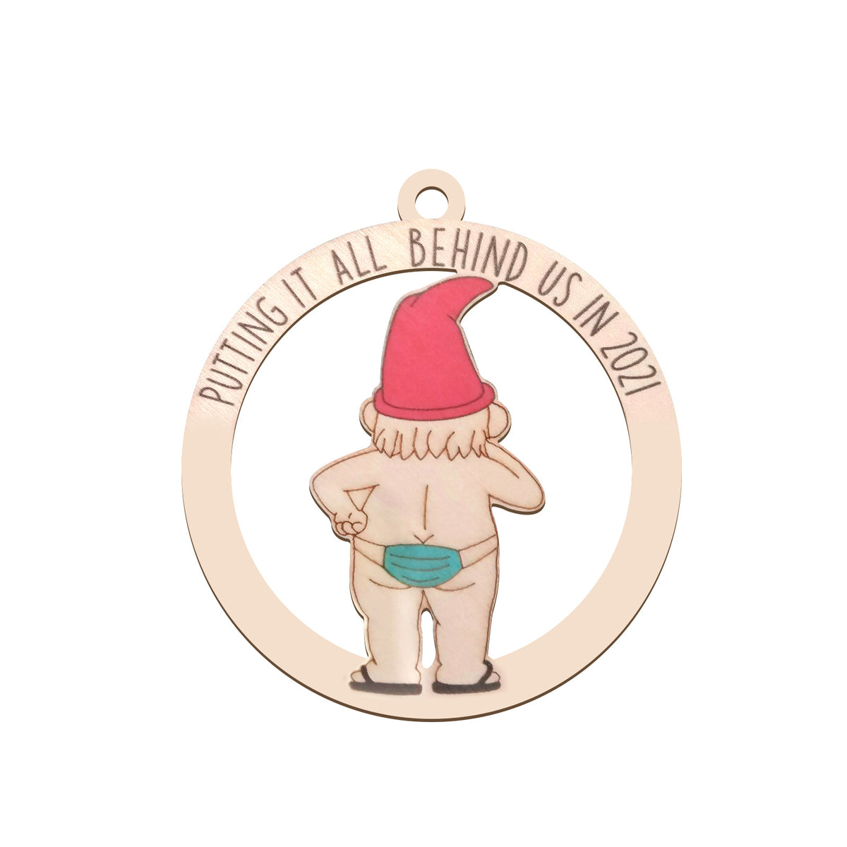 Natural wood grain surface on the small tree-shaped Christmas ornament