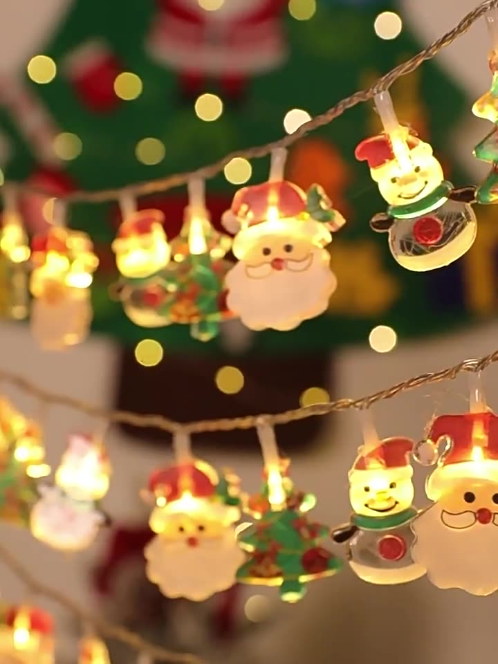 Mixed cartoon shapes spaced along the LED Christmas light chain