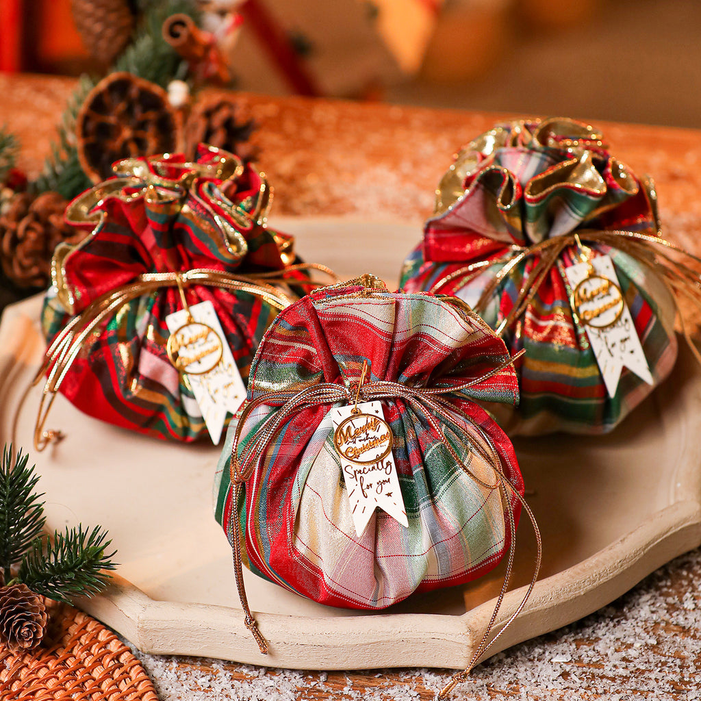 Wine red colorway of the same small fabric Christmas gift pouch