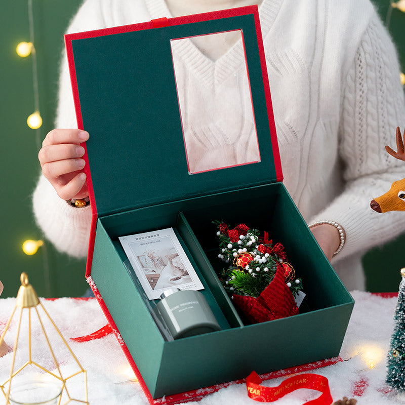 Lift off lid and base of the red keepsake Christmas gift box