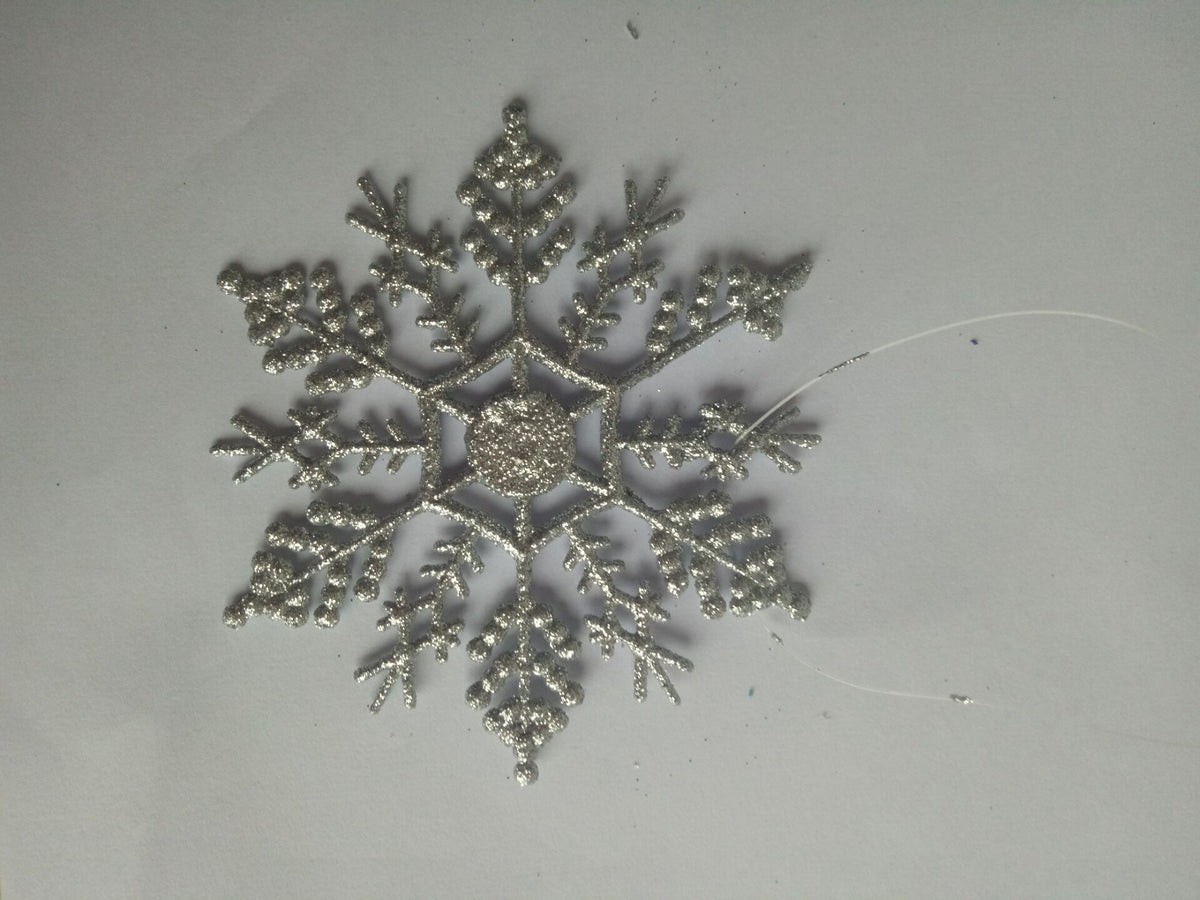 Acrylic snowflake that lets light pass straight through the cut arms