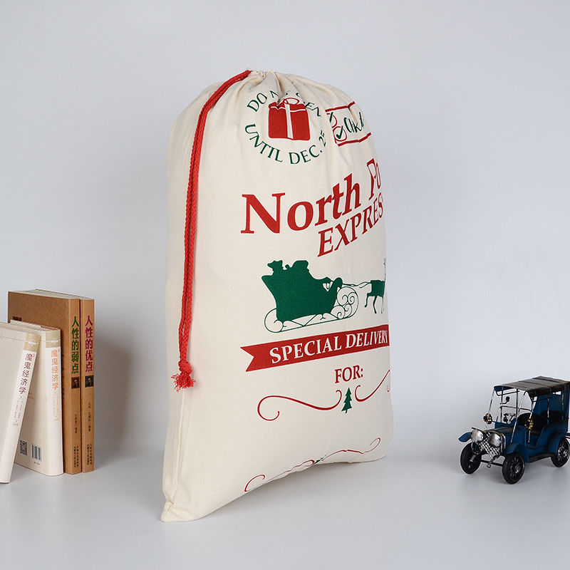 Large Christmas gift bag that closes at the top without wrapping paper