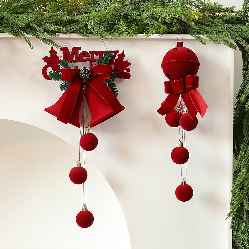 Flocked Christmas bell ornament finished with a matching wine red bow