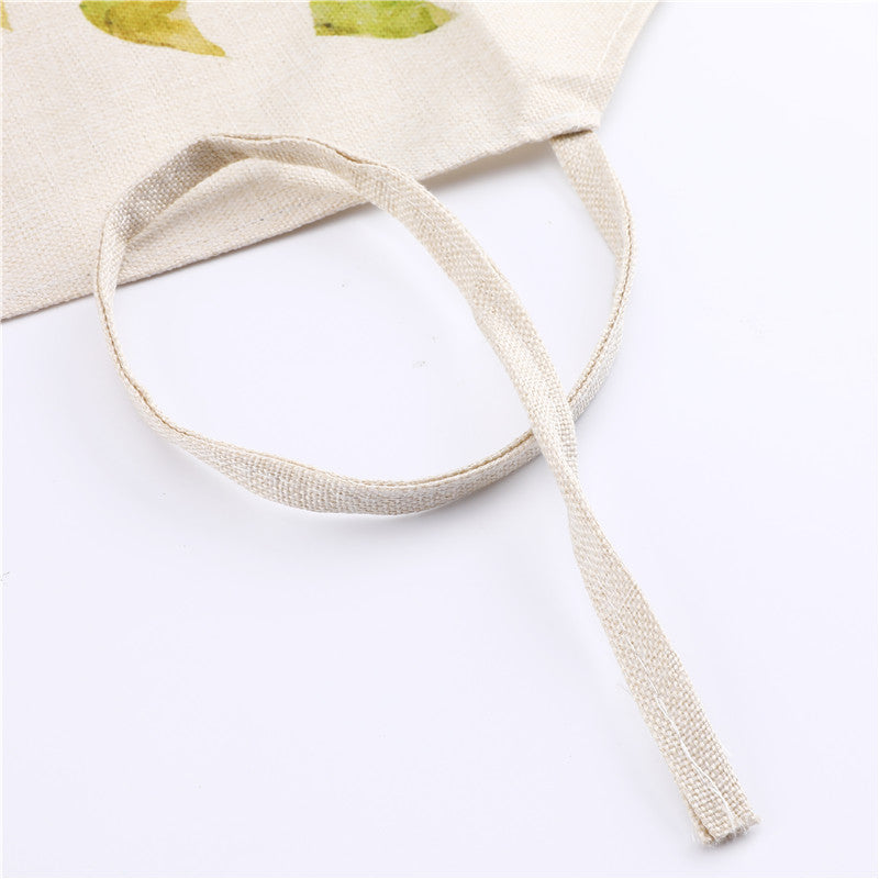 Printed polyester apron with a broad front panel and side seams