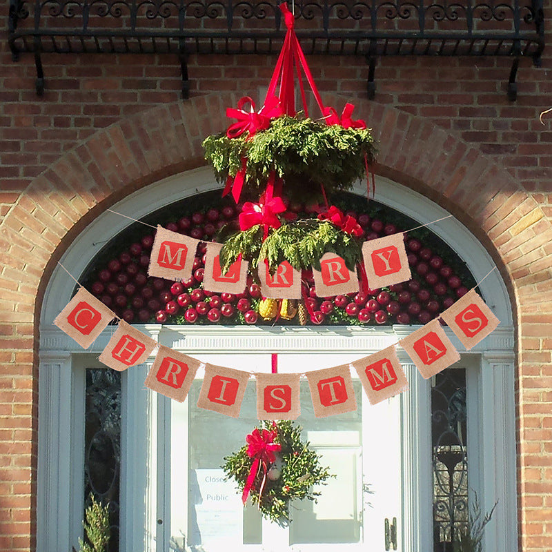 Brown and red burlap Christmas banner printed with a Merry Christmas greeting