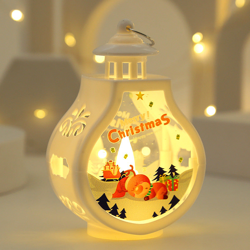 All four candle lamp designs, tree, snowman, Santa and reindeer