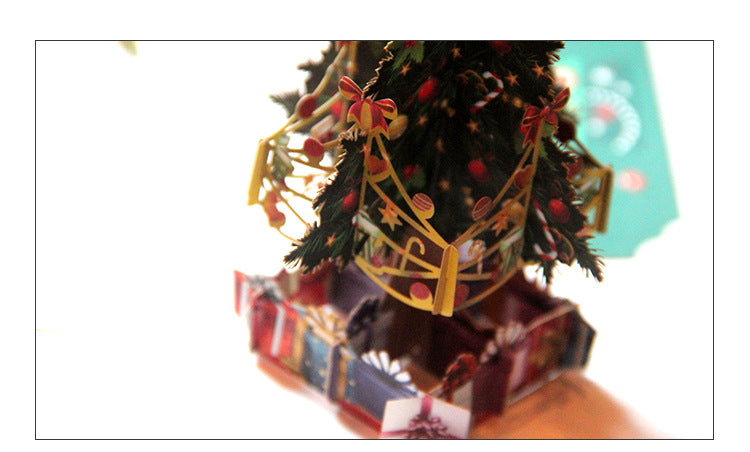 Christmas tree pop up card weighing about 1.2 ounces