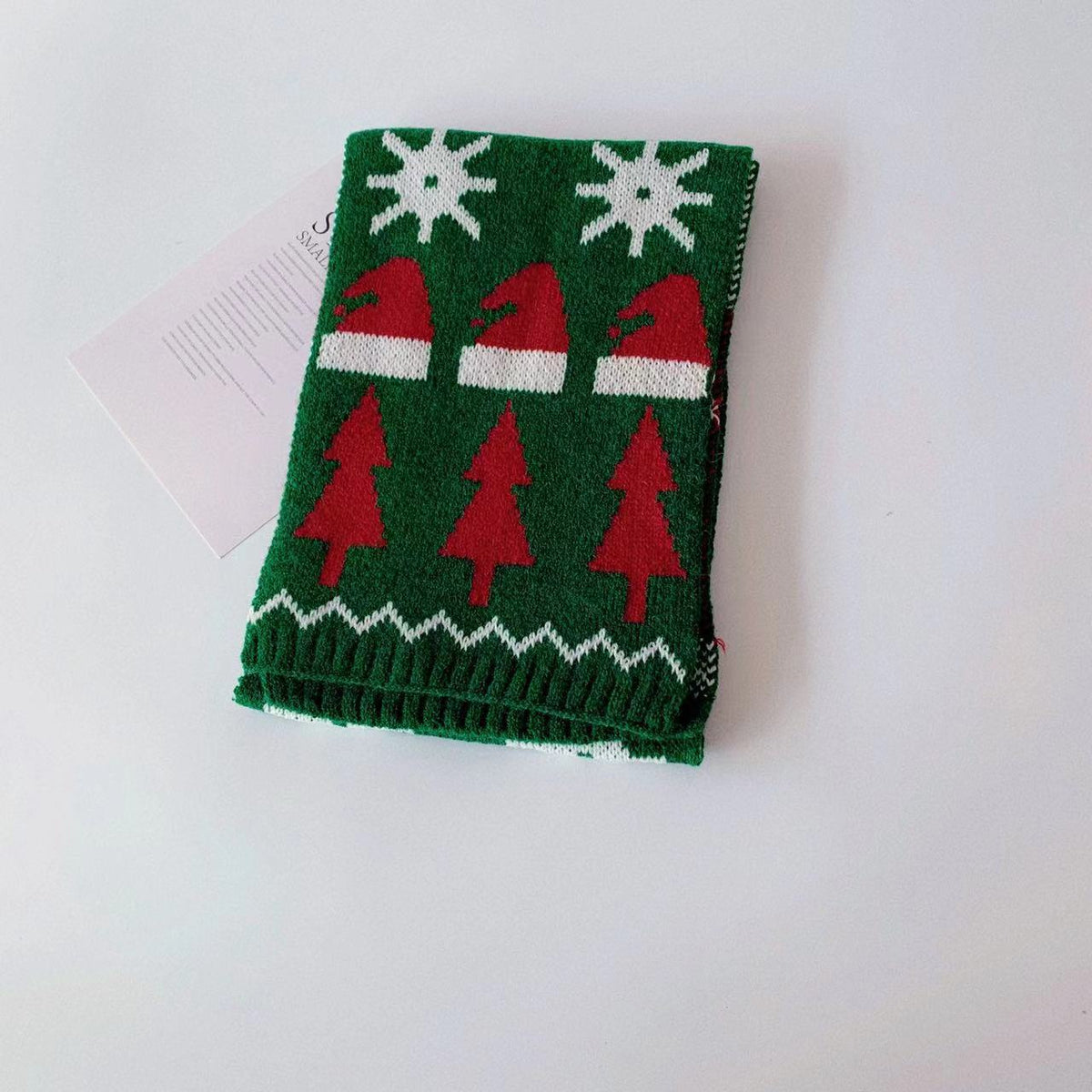 Soft knitted Christmas scarf sold singly in one of four designs