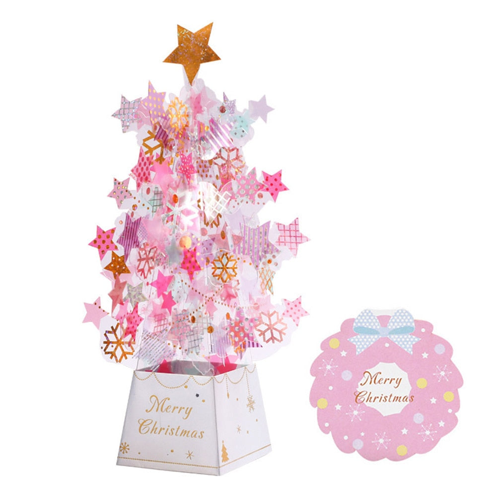 Square base printed with a Christmas greeting under the paper tree