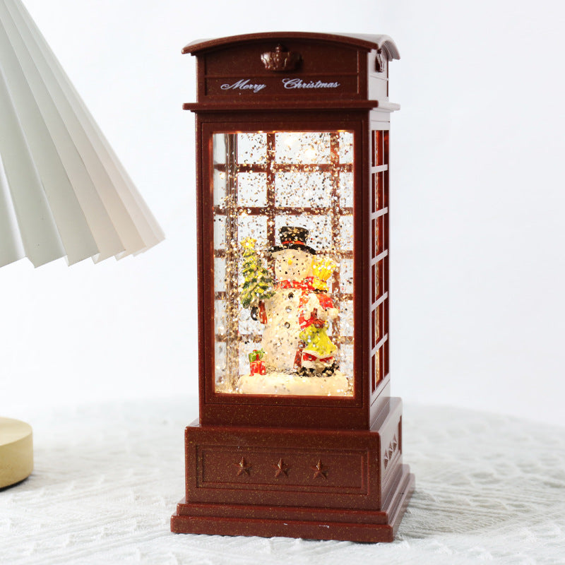 Telephone booth design with a snowman set in the doorway