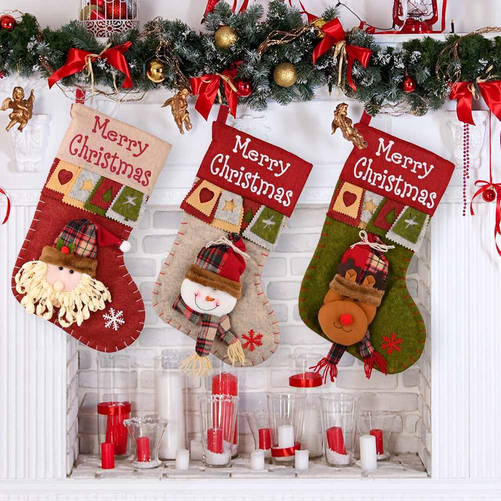 Santa, snowman and reindeer cartoon Christmas stockings in the same range