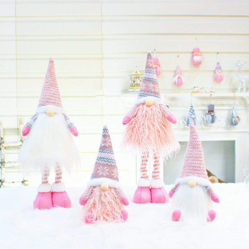 Plush beard and pointed hat on the faceless Christmas gnome doll