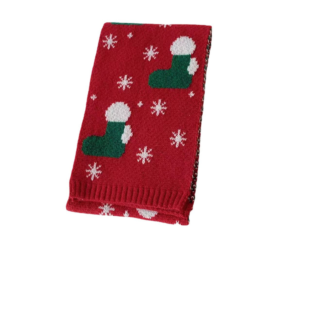 Four embroidered Christmas scarf designs offered in the same knitted range