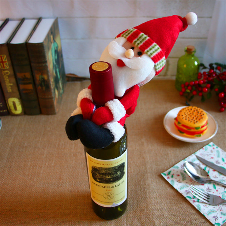 Christmas bottle cover with an artificial wool trim over cloth