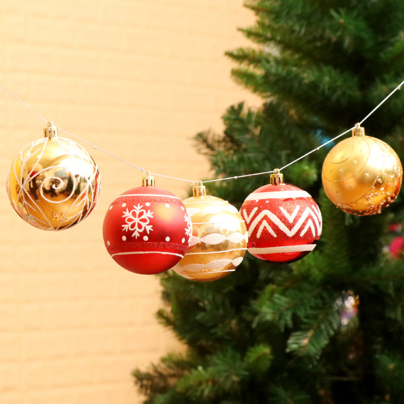 Hand painted Christmas bauble measuring 2.4 inches across
