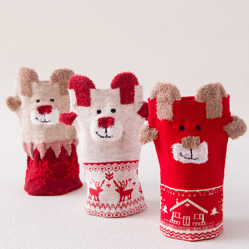 Santa Claus patterned Christmas socks in a polyester and cotton knit