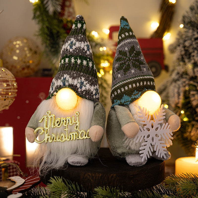 Gnome woman with light sewn from polyester and soft cloth