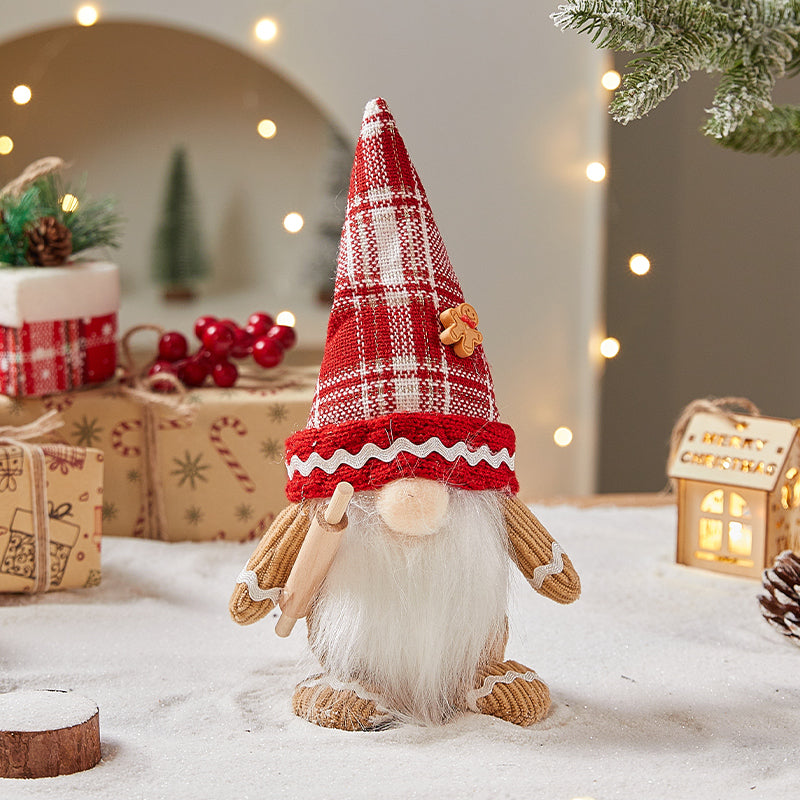 Cloth gingerbread man ornament with stitched detailing, one piece per order