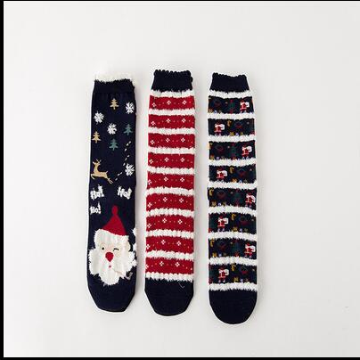 Large red reindeer design Christmas socks sold as one pair