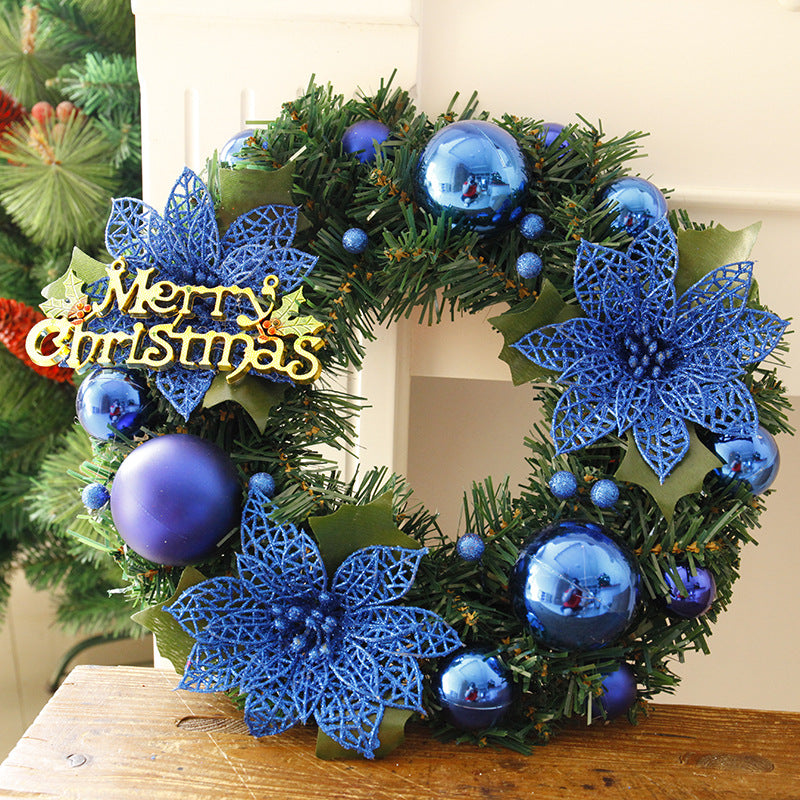 Molded leaves and trims on a small plastic Christmas wreath