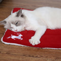 Red Christmas dog mat offered in small, medium, large and extra large