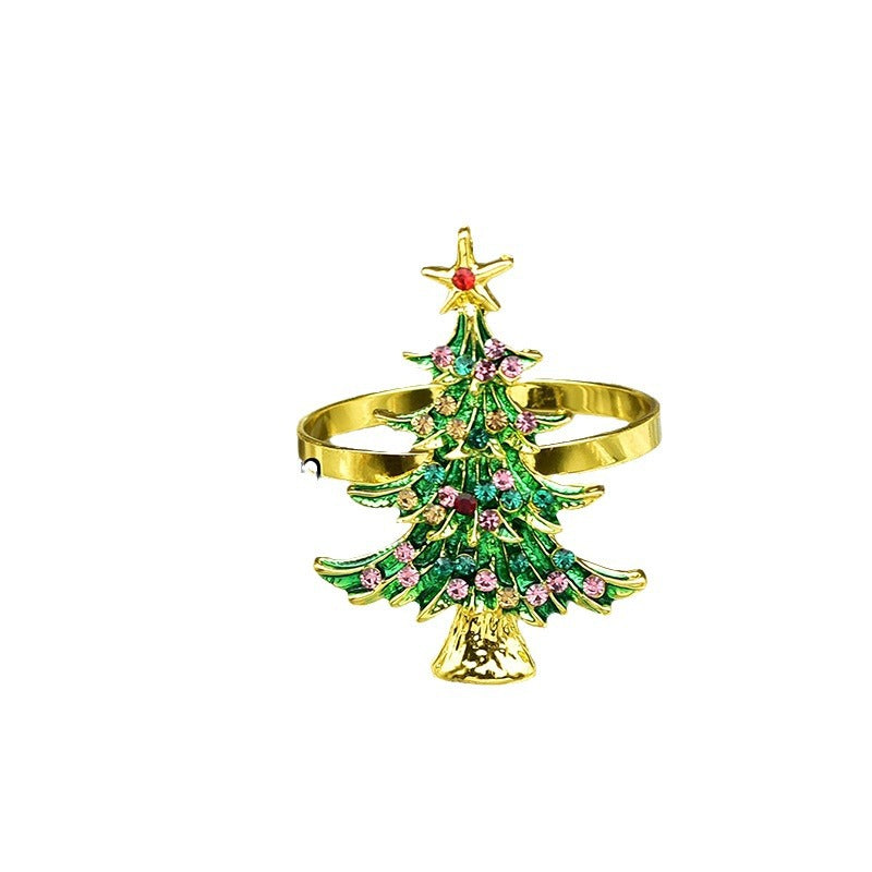 Solid metal Christmas napkin ring with a green plated surface