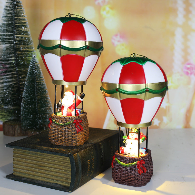 Snowman in a hot air balloon version of the resin figurine
