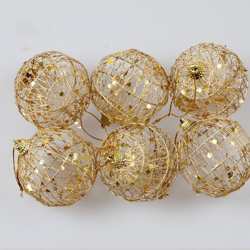 Gold Christmas ball ornament, 2 inches across, for hanging on a tree