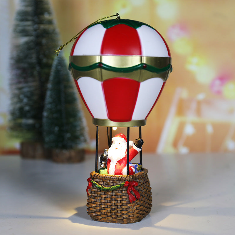 Complete resin Christmas balloon ornament supplied ready to stand