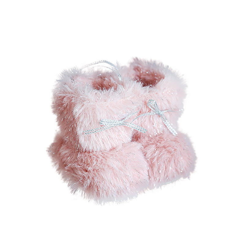 White plush boot ornament for a neutral or pastel Christmas tree