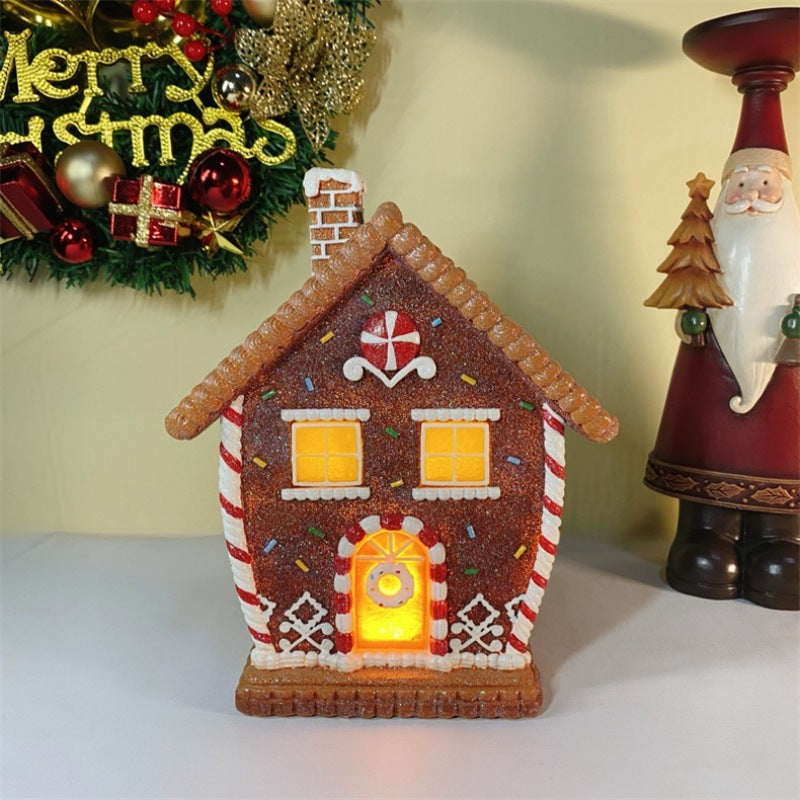 Resin gingerbread house Christmas decoration that lights from within