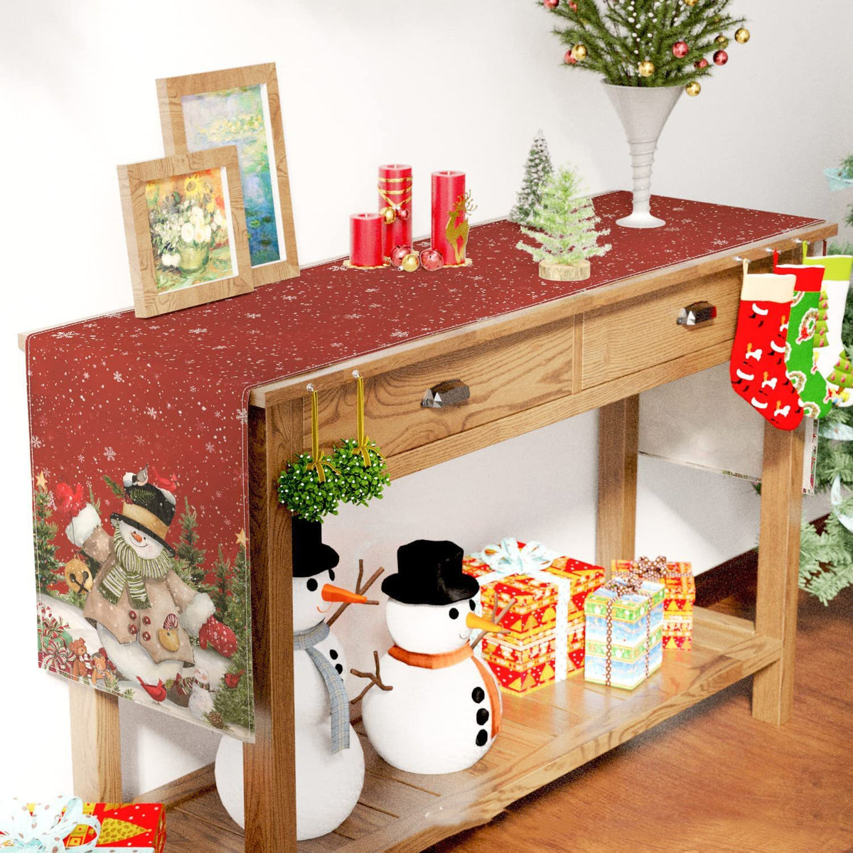 Red Christmas table runner printed with a snowman design