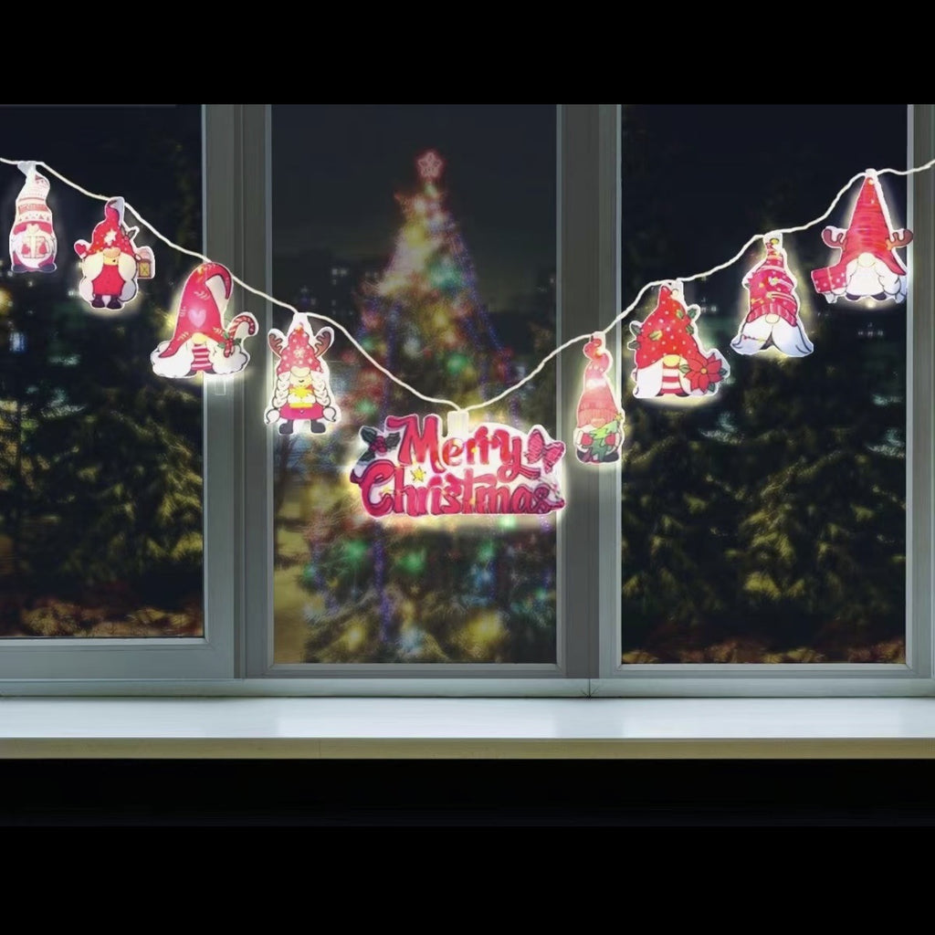 Nine bulb Christmas string light with cartoon shaped covers