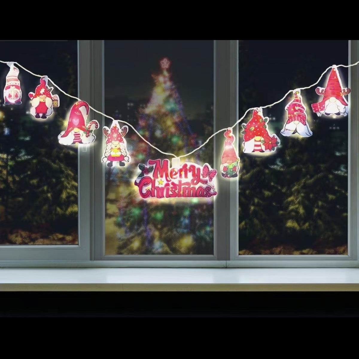 Nine bulb Christmas string light with cartoon shaped covers