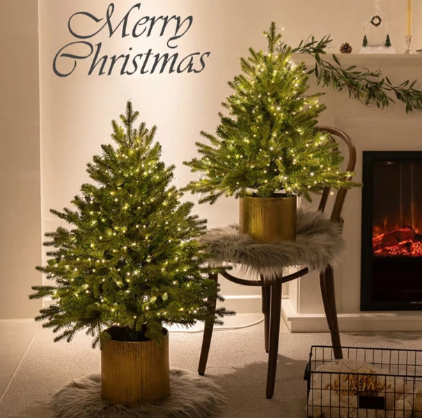 Plug-in pre-lit tabletop Christmas tree with 100 lights already fitted