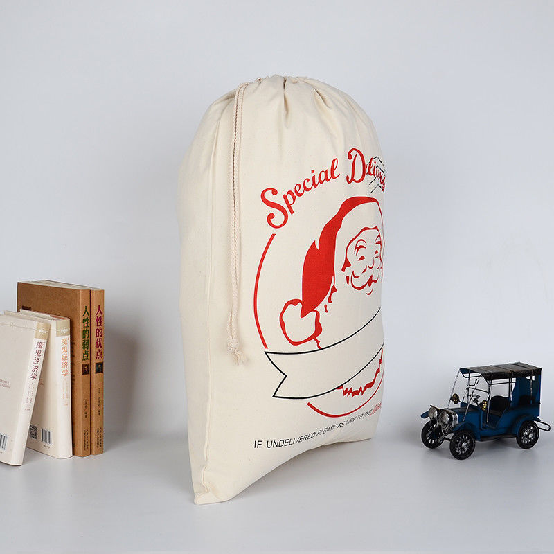 Two large Christmas gift sacks in different prints from the six designs