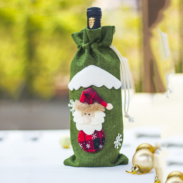 Christmas bottle sock sewn from cloth and artificial wool