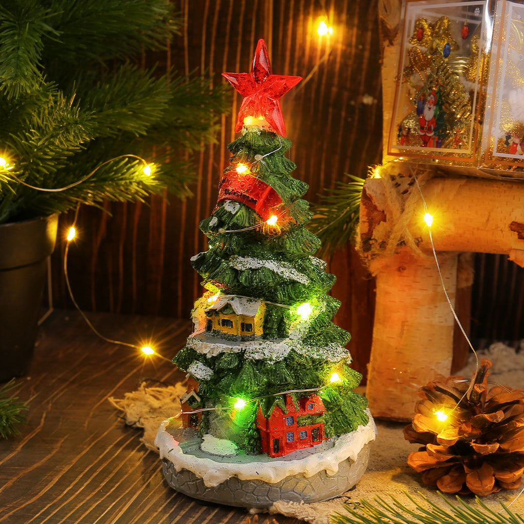 Square 3.9 by 3.9 inch base under the resin Christmas tree