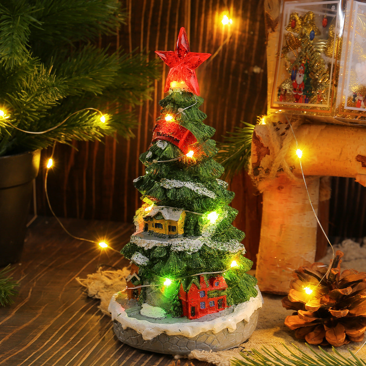 Square 3.9 by 3.9 inch base under the resin Christmas tree