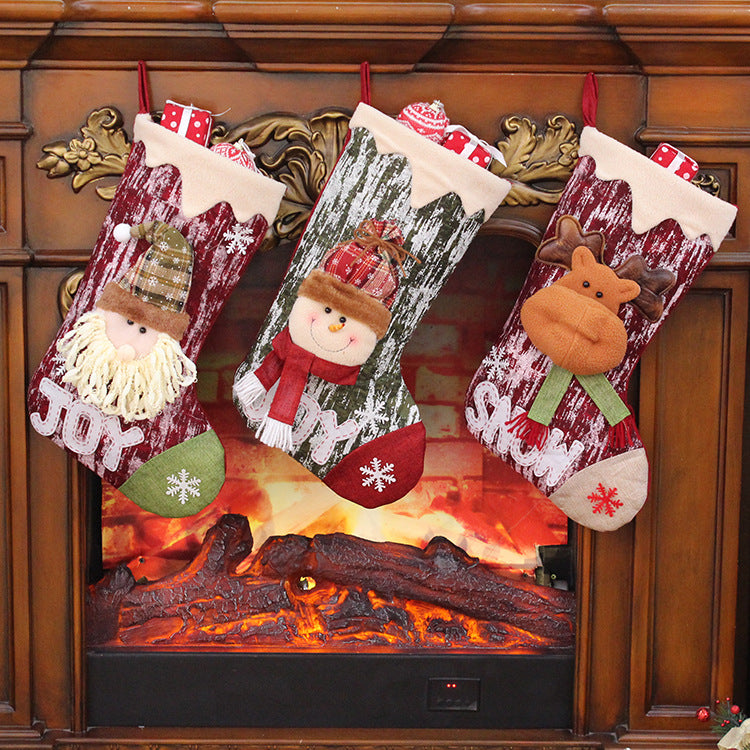 All five knitted doll Christmas gift bag designs in the range