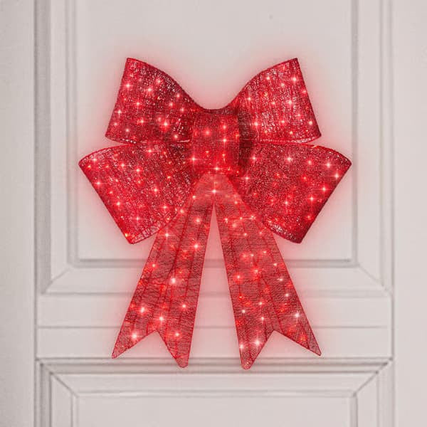 Satin bow decoration in classic Christmas red, one colorway only
