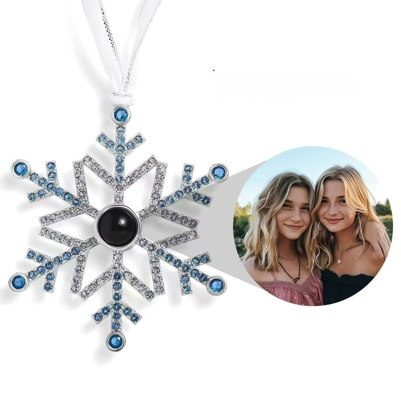 Small snowflake charm cast in alloy with an even plated shine