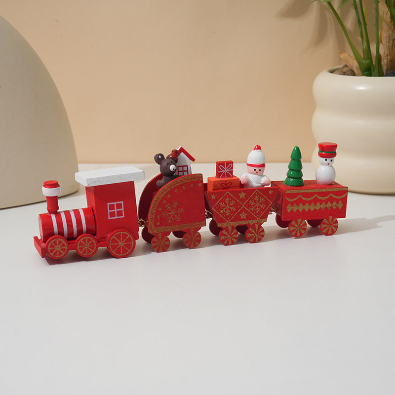 Painted detail and turned wheels on a solid wood Christmas train