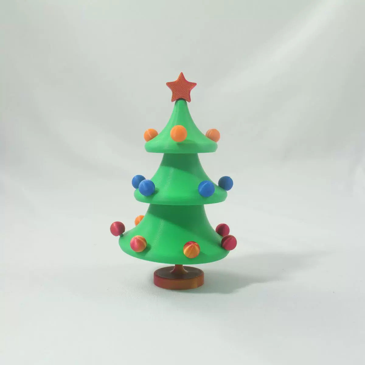 3D printed articulated Christmas tree fidget toy with linked bending segments