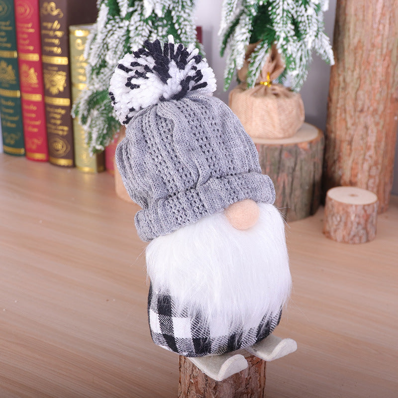 Red and gray skiing doll figures, each colorway sold singly